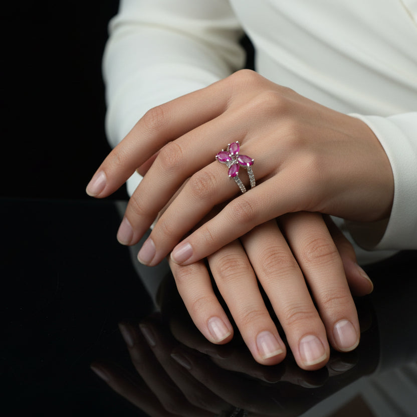 Silver ring with a pink gemstone on a dark background, branded 'Saheli My Best Friend'.