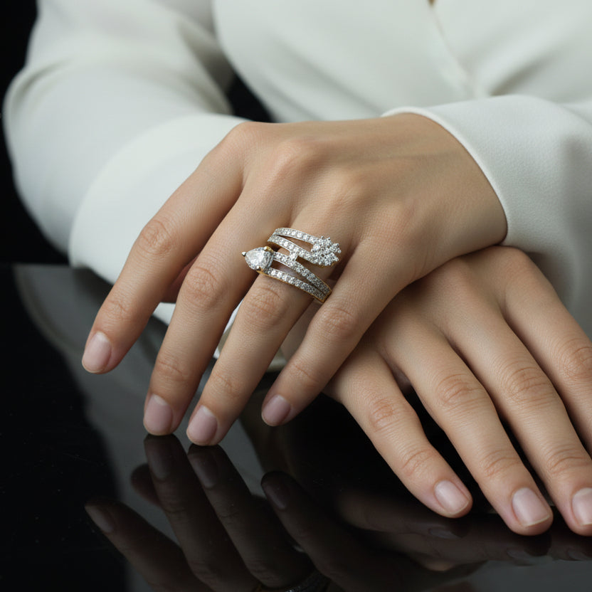 Two diamond rings with a 'Saheli' tag on a dark background