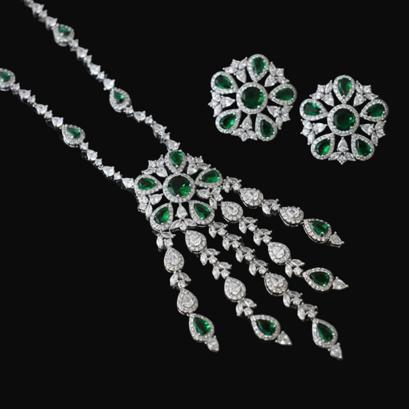 Jewelry set with necklace and earrings on a dark background