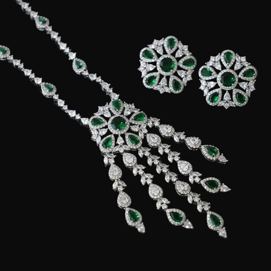 Jewelry set with necklace and earrings on a dark background