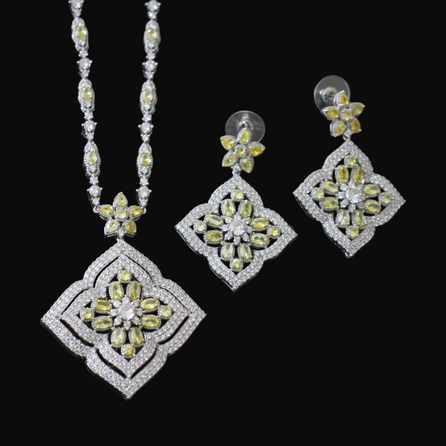 Jewelry set with necklace and earrings on a black background