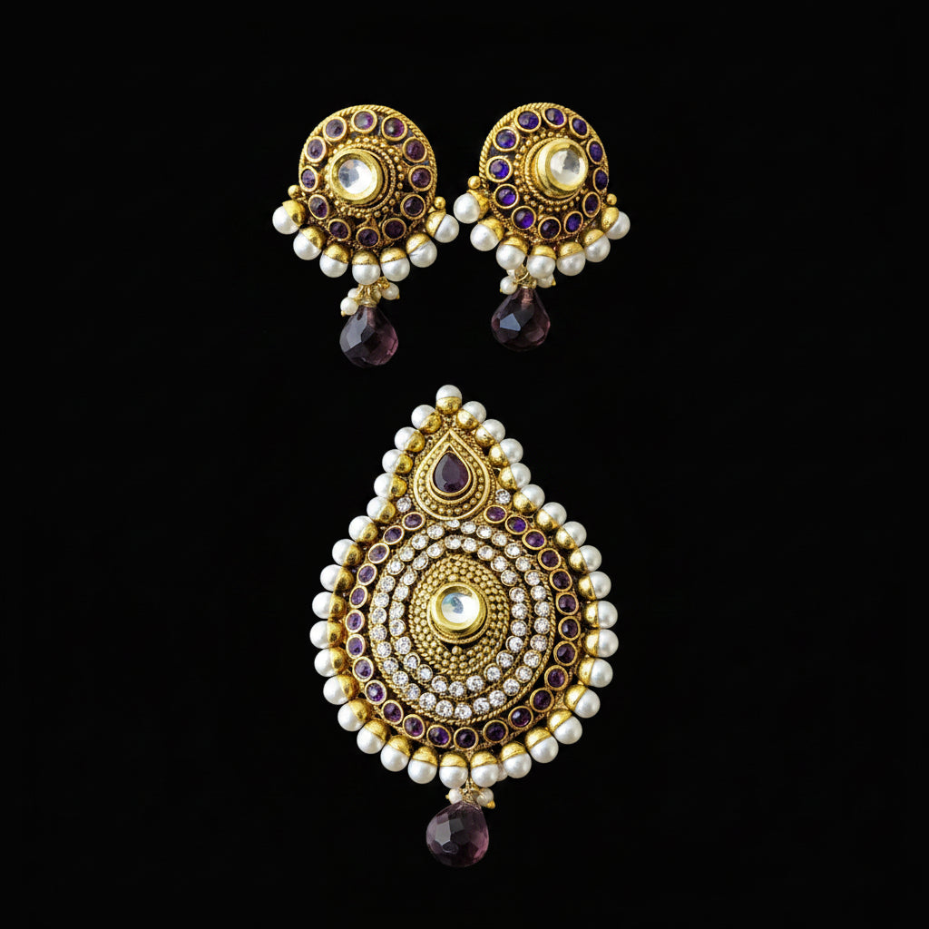 Ornate gold and pearl earrings with gemstones on a dark background, featuring the brand 'SAHELLI'.