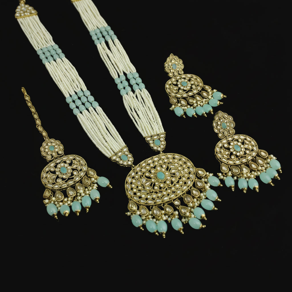 Jewelry set with necklace, earrings, and hair accessories on a dark background
