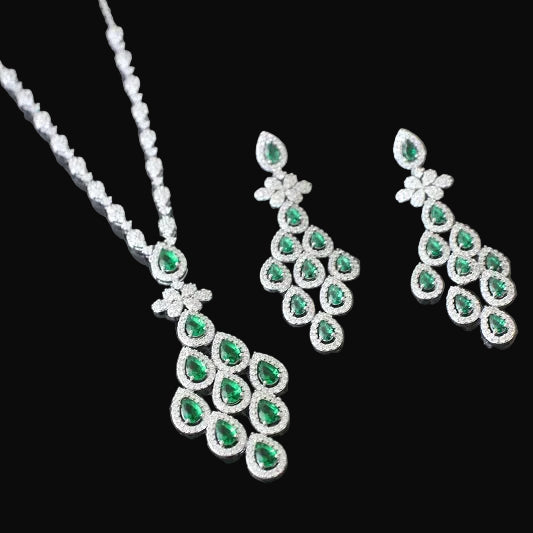 Jewelry set with necklace and earrings on a dark background