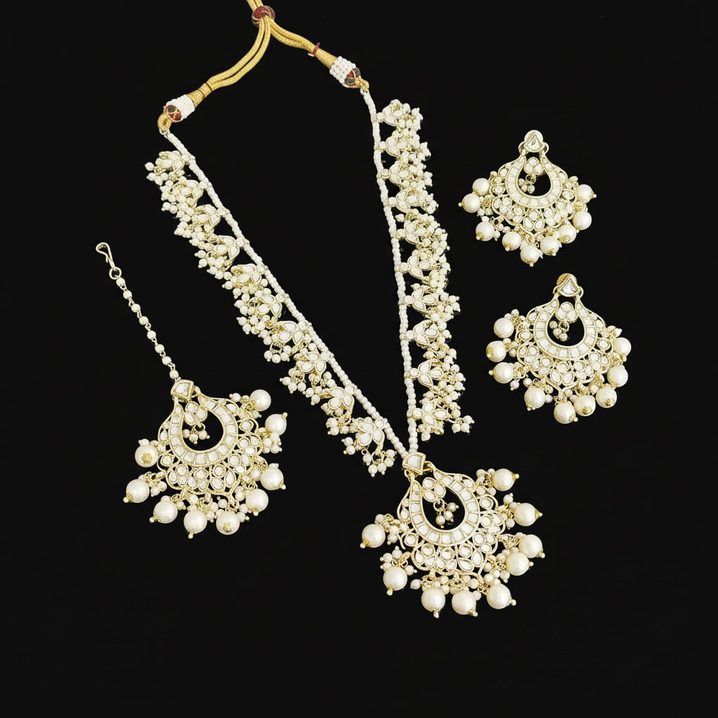Pearl necklace and earrings set with 'SAHELI' branding on a dark background