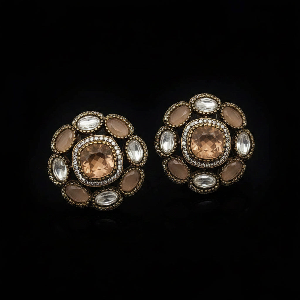 Decorative earrings with brown and clear stones on a light gray background, featuring SJNX-CODE-R-135.